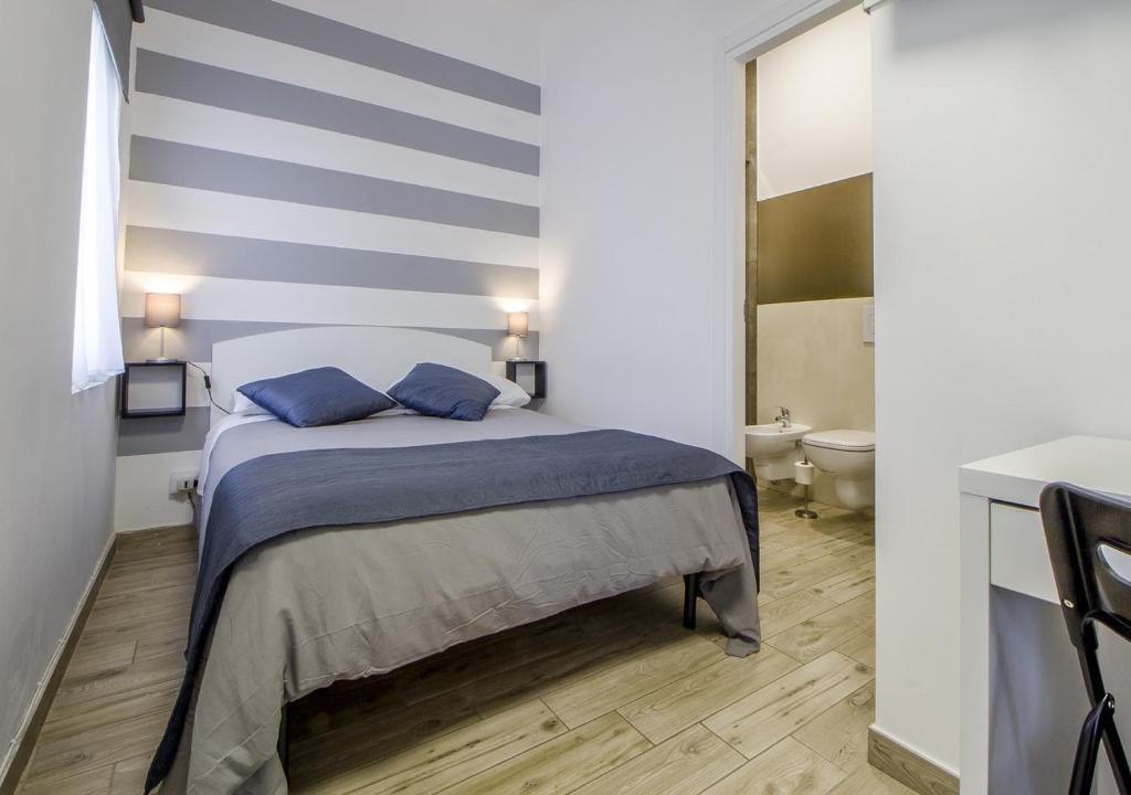 Appartamento con 2 camere e 2 bagni in centro con parcheggio